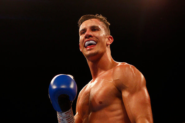 <b>Boxer With Bulging Biceps Busts Out Moves</b>