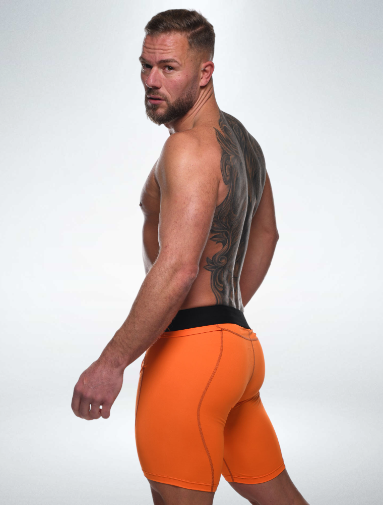 Defined Behind: Compression Shorts - Action Orange